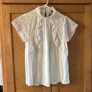 Lot of two similar medium shirts.